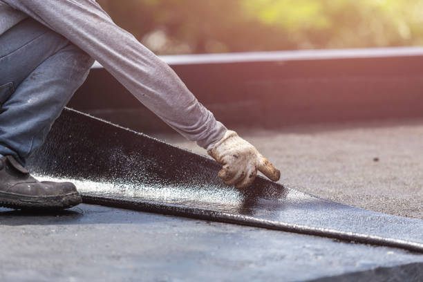 Professional Basement Waterproofing technician working in Greenville, IL